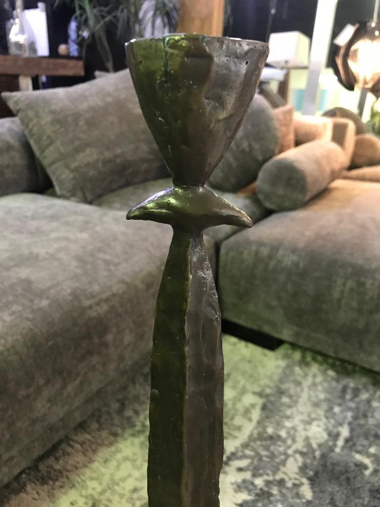 Bold. Heavy. Striking. This candlestick (model CS15-1) was made by renowned American sculptor Tom Corbin. 

Signed and dated by Corbin in the base.

The TOTEM works are very sought after and becoming hard to find.

Would clearly stand out in