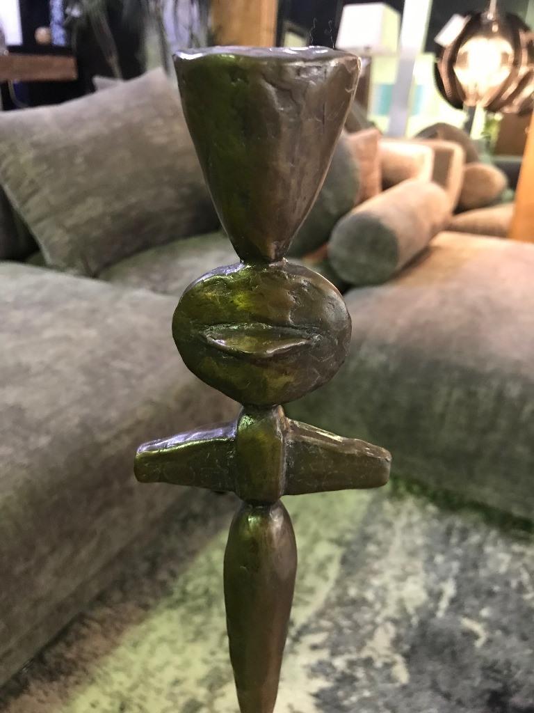 Bold. Heavy. Striking. This sculpture/ candlestick (model CS18-2) was made by renowned American sculptor Tom Corbin. 

Signed and dated by Corbin in the base.

The TOTEM works are very sought after and becoming hard to find.

Would clearly
