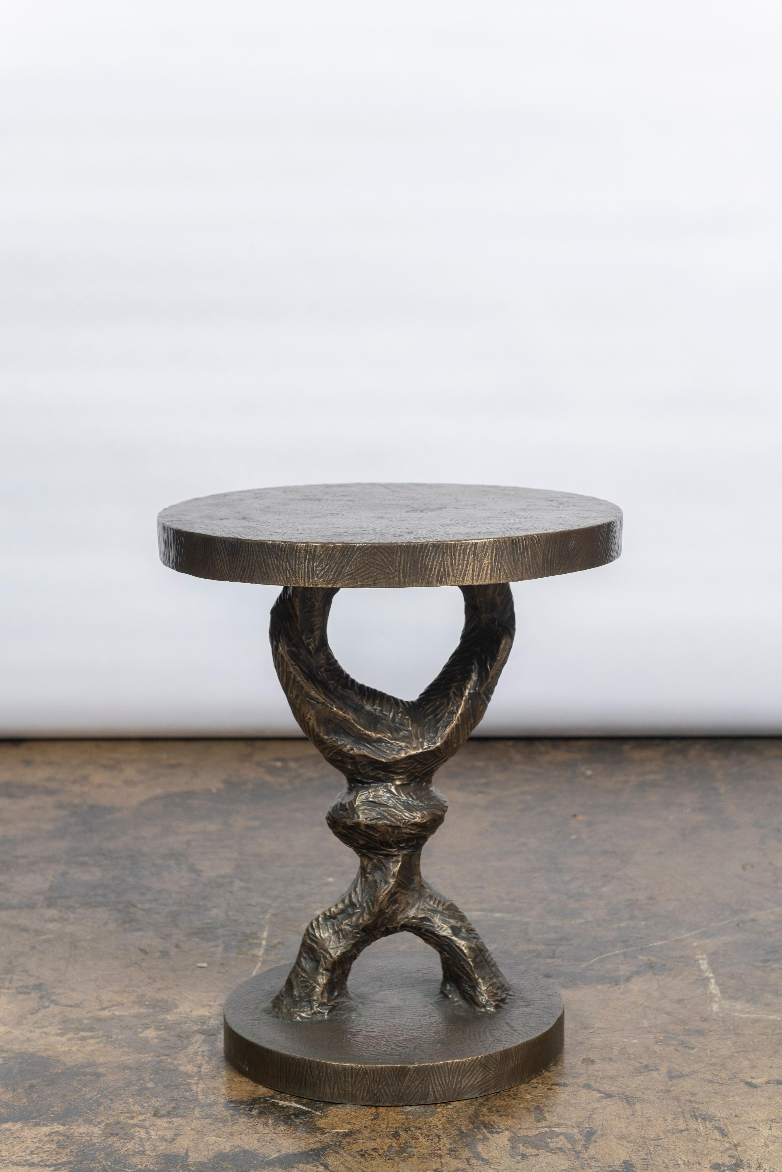 A beautiful table / pedestal by renowned American artist/ sculptor Tom Corbin. A piece of art on its own, this work is a great size to hold a beverage, light source, plant or florals. Corbin's furniture and sculpture is highly coveted as seen in