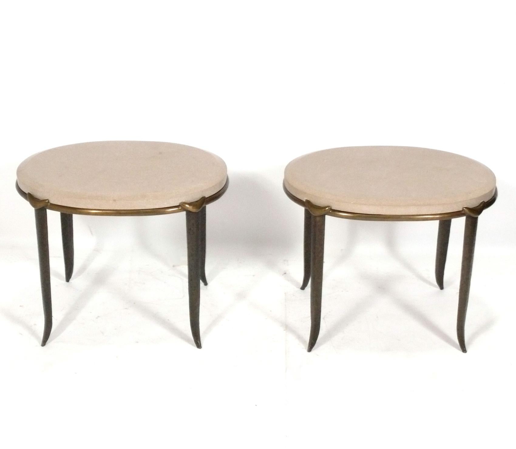 Sculptural solid bronze and marble tables, handmade by Tom Corbin, American, circa 2000s. They are a versatile Size and can be used as end or side tables, or as nightstands. They retain their warm original patina. Corbin's work was clearly