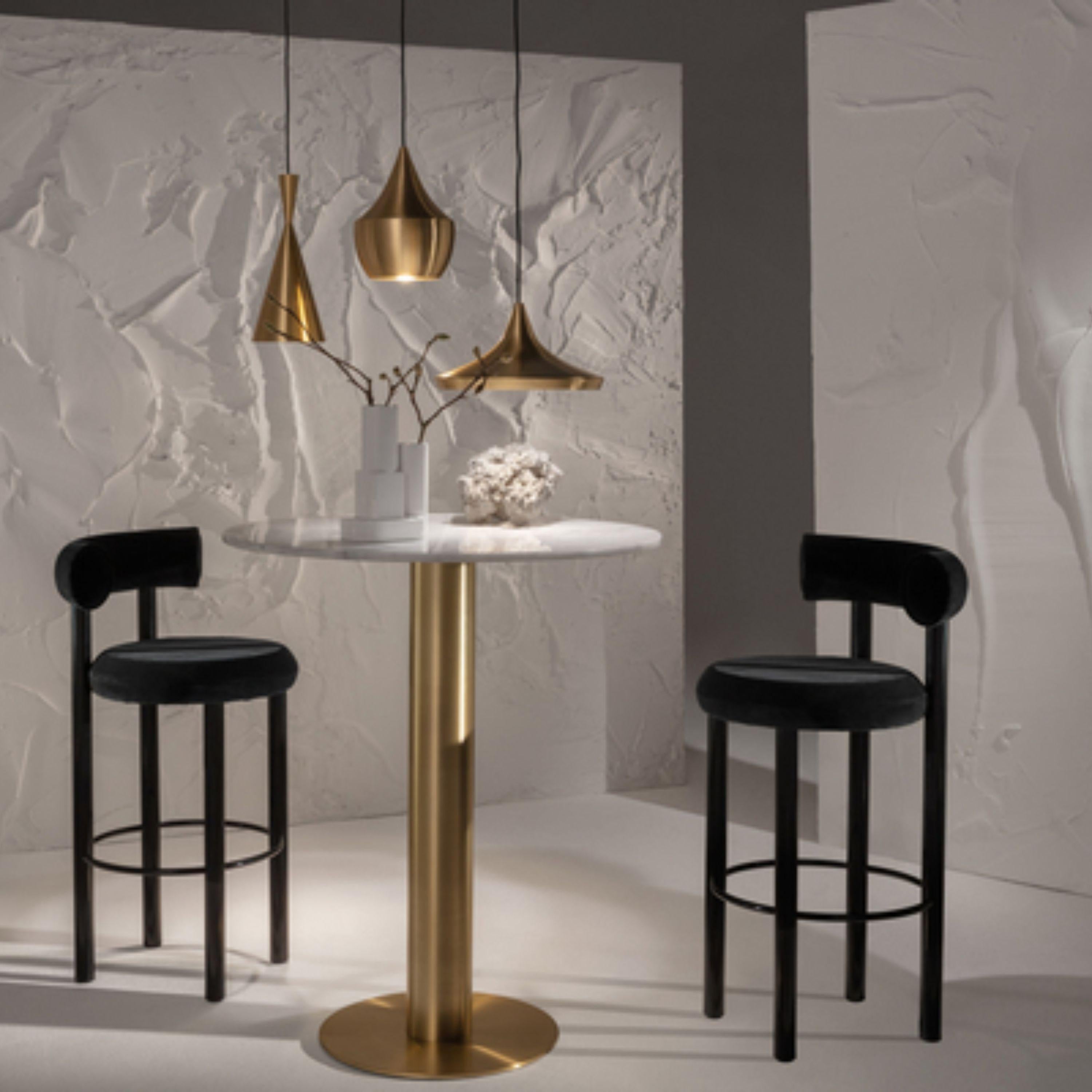 Tom Dixon 'Beat Fat' Metal Pendant in Brass

The 'Beat' pendant is part of Dixon's iconic series of LED lighting and accessories executed in hammered metal. Designed in 2005, the Beat is bold in silhouette and simple in function. The hand-hammered