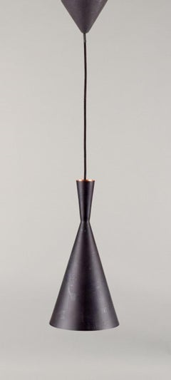 Tom Dixon. Beat Light Tall pendant from hammered metal.