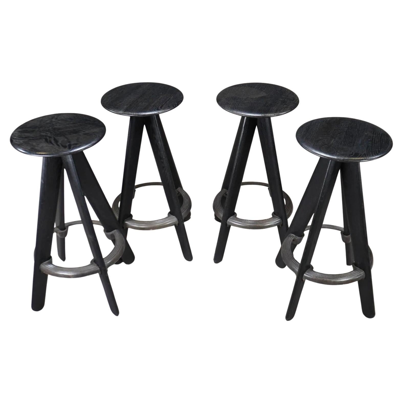 The Tom Dixon Slab Stool celebrates the natural beauty of oak with generous proportions and softly rounded edges. Made from solid oak from sustainably managed forests, these stools showcase the deep grain of the wood, available in natural or black