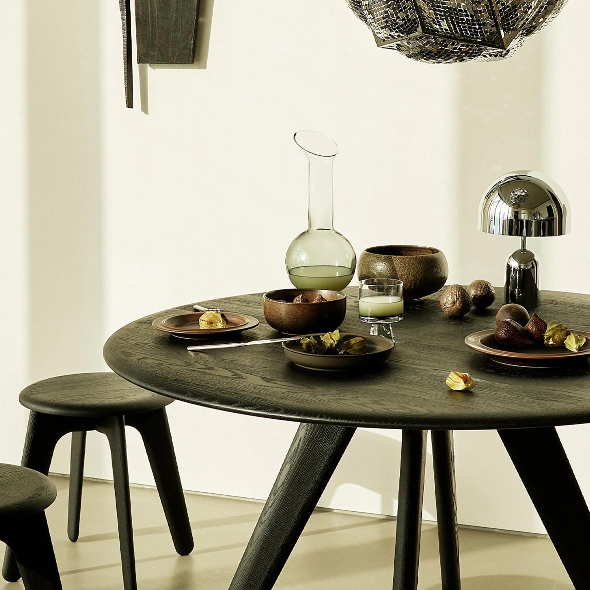 Tom Dixon Natural Oak 'Slab' 48-inch Round Dining Table

Originally designed in 2010 and updated in 2022, Tom Dixon's Slab table is constructed in simple geometric shapes that celebrate the natural beauty of solid oak. Each piece has generous