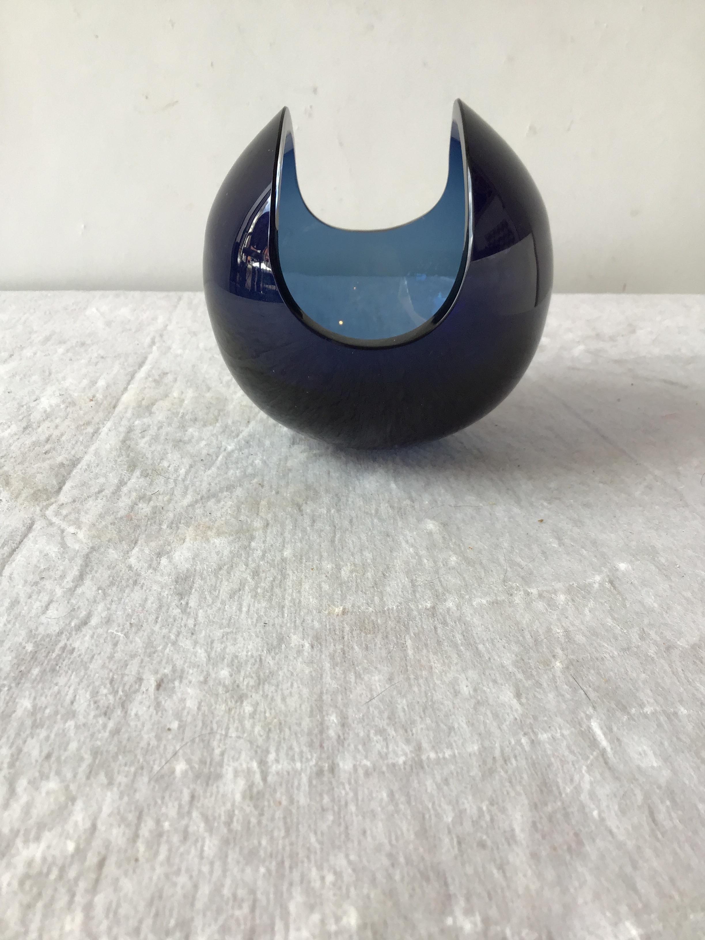 Tom Dixon blue glass orb vase.