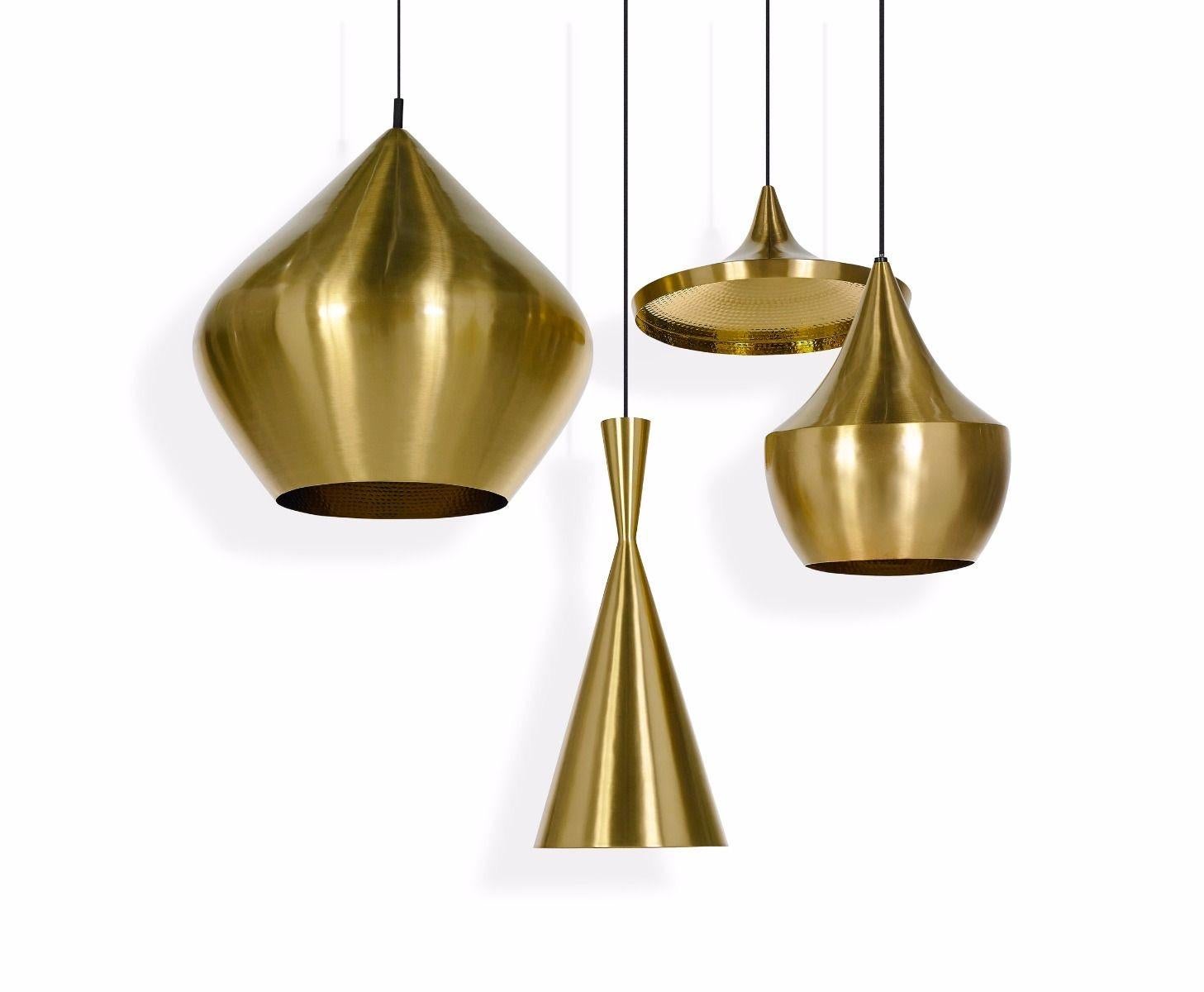 Tom Dixon burnished brass beat stout pendant light fixture, modern lighting, UK. Iconic contemporary design. New in box, never installed. MSRP 1270 USD.

Without a contrasting exterior finish, beat is left in its purest form, a warm golden brass