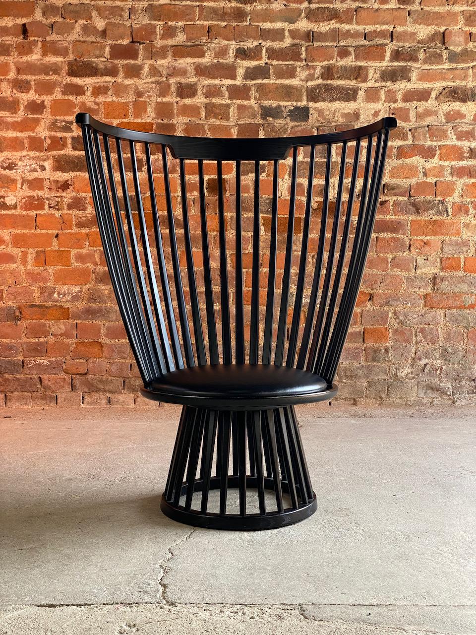 Tom Dixon fan chair in black ash & leather

Fabulous bold and striking Tom Dixon Fan chair in black on black, a true statement piece, a dramatic and sculptural take on the Classic British design of the ‘Windsor Chair’, with its semi-transparent