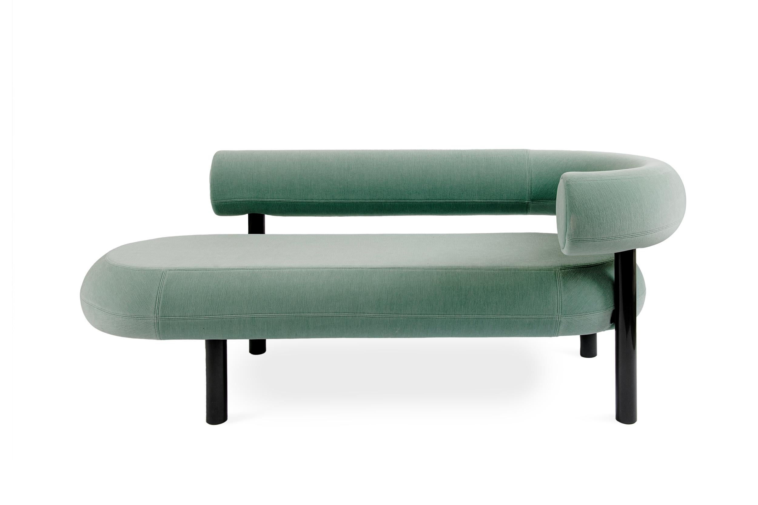 Tom Dixon Fat Chaise Lounge - 
Designed to hug the body and allowing for multiple sitting positions, this Tom Dixon Fat chaise lounge is upholstered in Kvadrat Gentle 2. 

Made from moulded foam with a metal leg launching in high gloss black lacquer