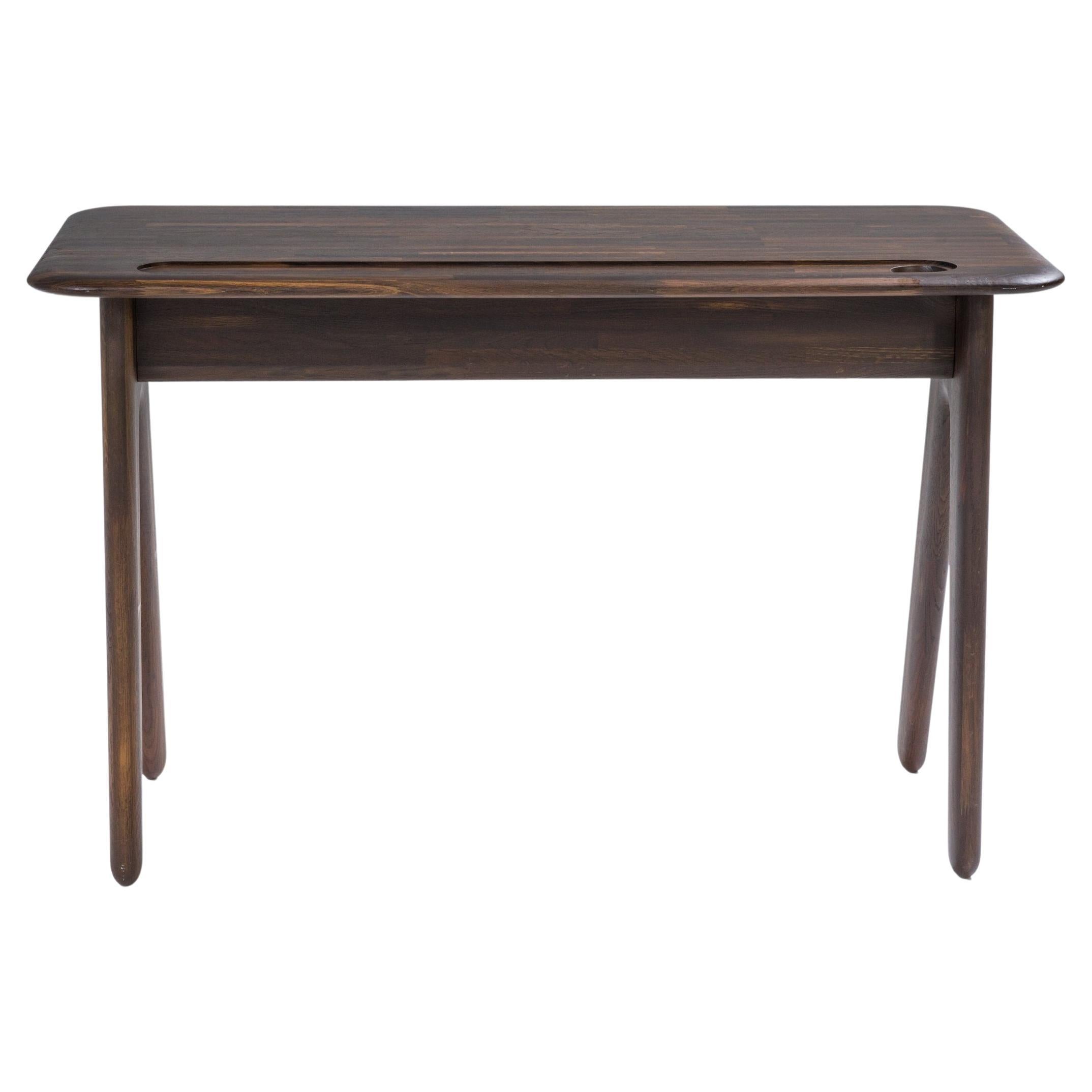 Designed by Tom Dixon, one of the best known British designers of the 21st century, the Slab collection combines quality materials with a sleek aesthetic.

Inspired by traditional Victorian school desks, the Slab desk has a sleek minimalist