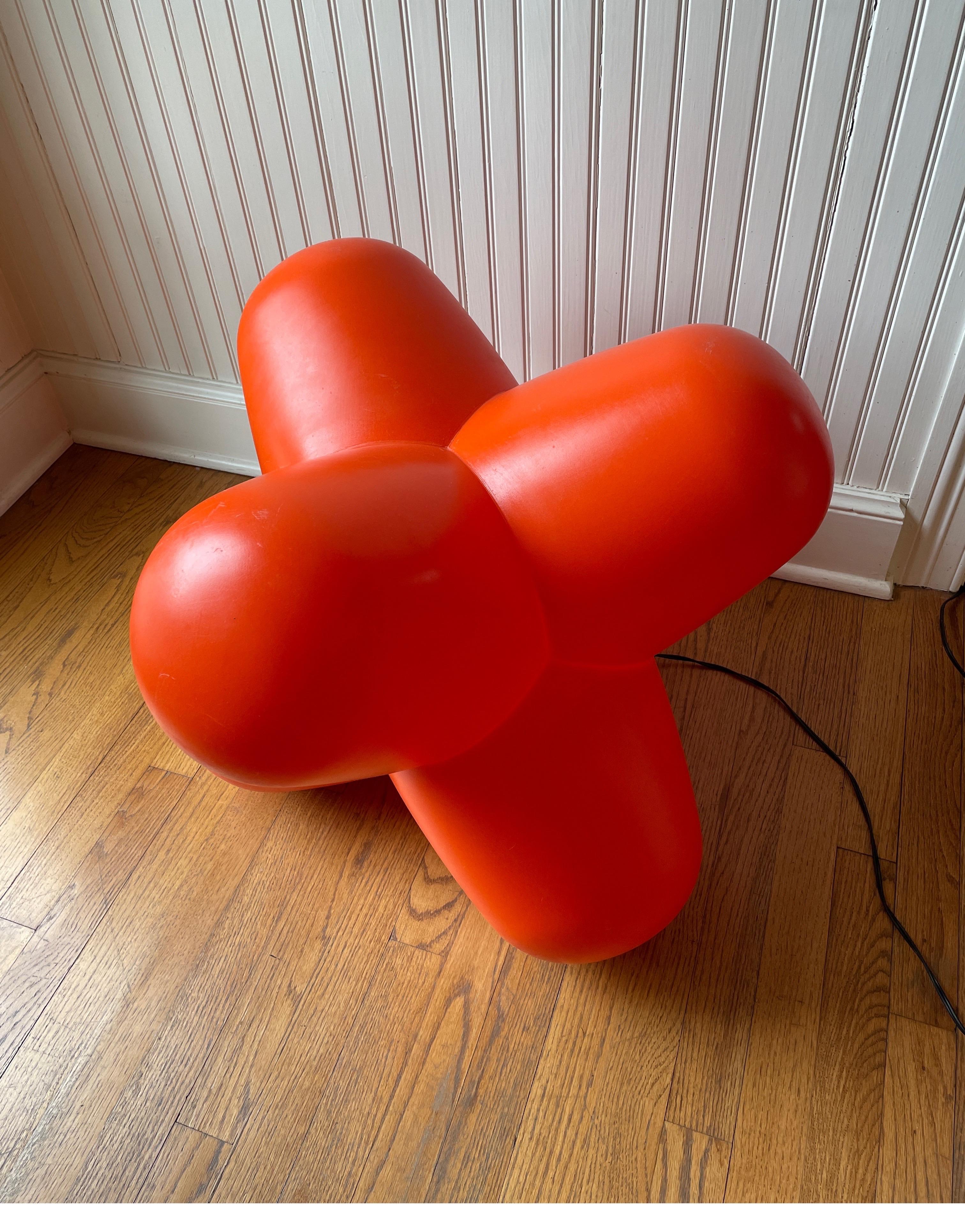 Tom Dixon “Jack” light by Euro lounge. Has a bulb inside that lights up. Can also be used as a seat or side table.