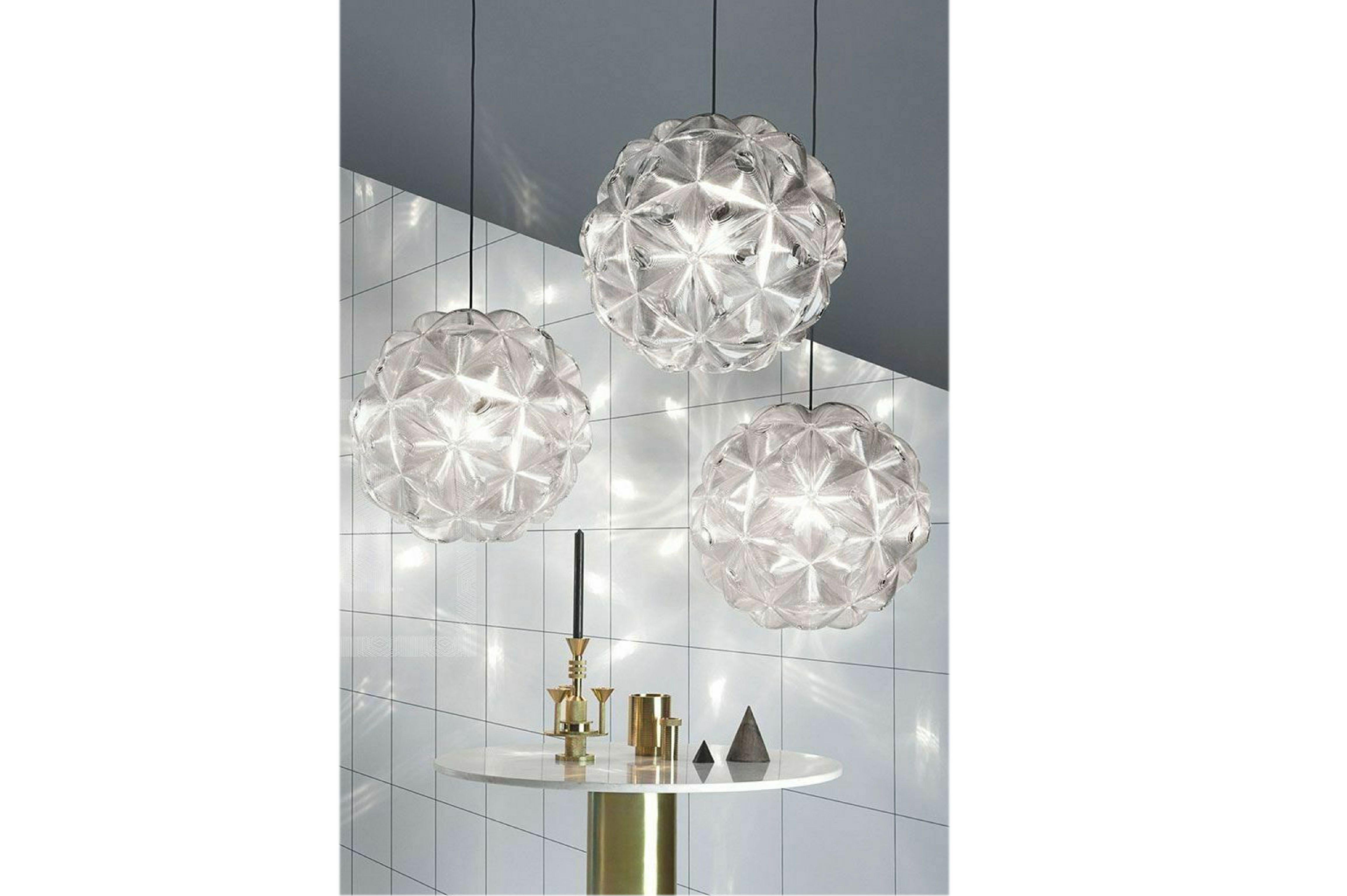 Tom Dixon lens pendant, spherical ceiling light, globe chandelier, 2019. A spherical pendant light made of 60 triangular polycarbonate lenses that refract and focus the lightbulb in an unusually luminous way. MSRP 1080 USD.
 Cable length