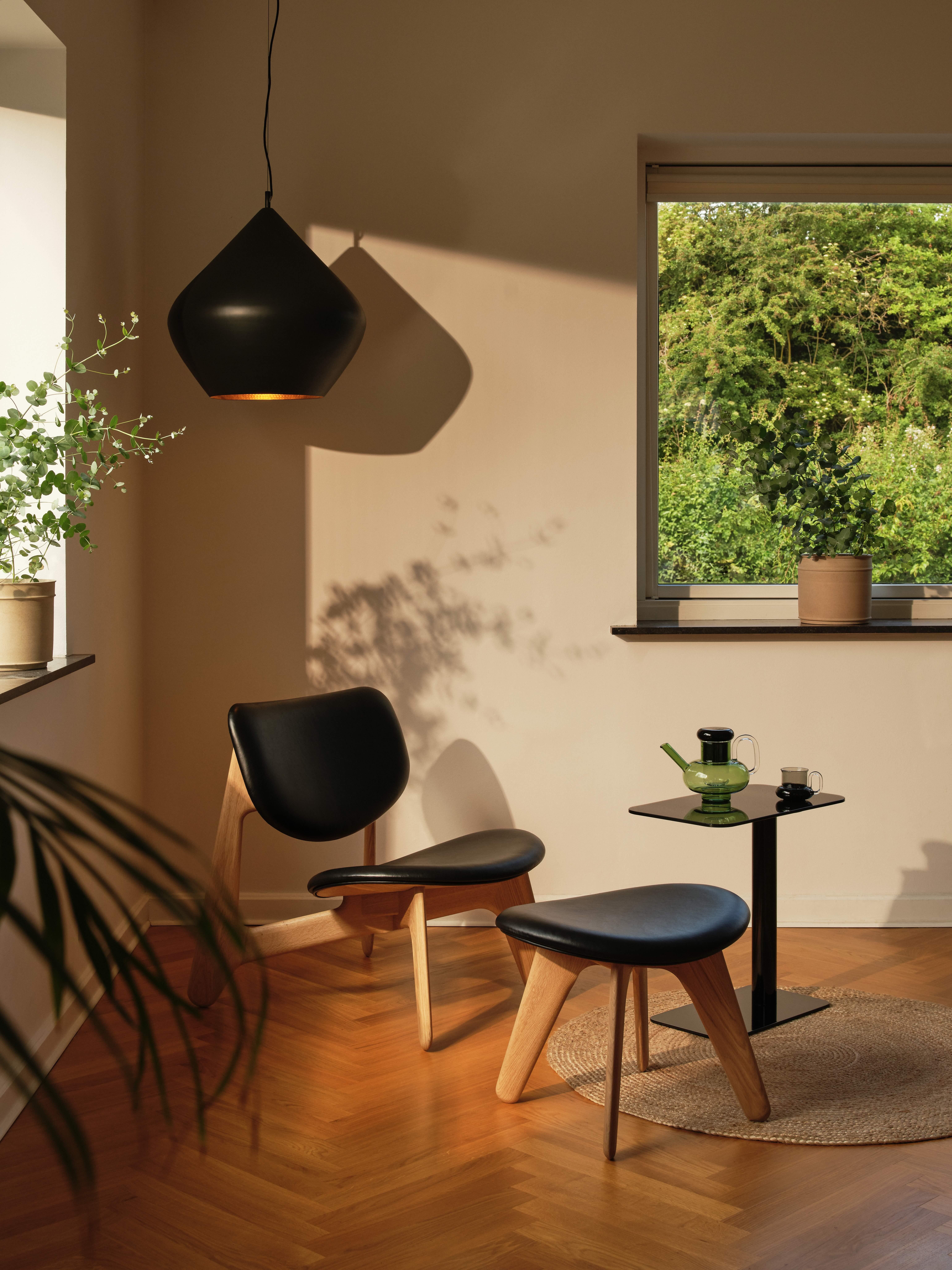Tom Dixon Natural Oak Wood and Black Leather 'Slab' Lounge Chair

Part of his expanding line of furniture, Tom Dixon's Slab Lounge Chair is constructed in simple geometric shapes that celebrate the natural beauty of solid oak. Each piece has