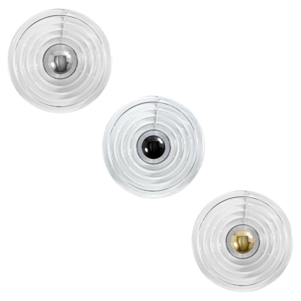 Applique ronde « Press Surface » de Tom Dixon en verre transparent avec capuchon interchangeable
