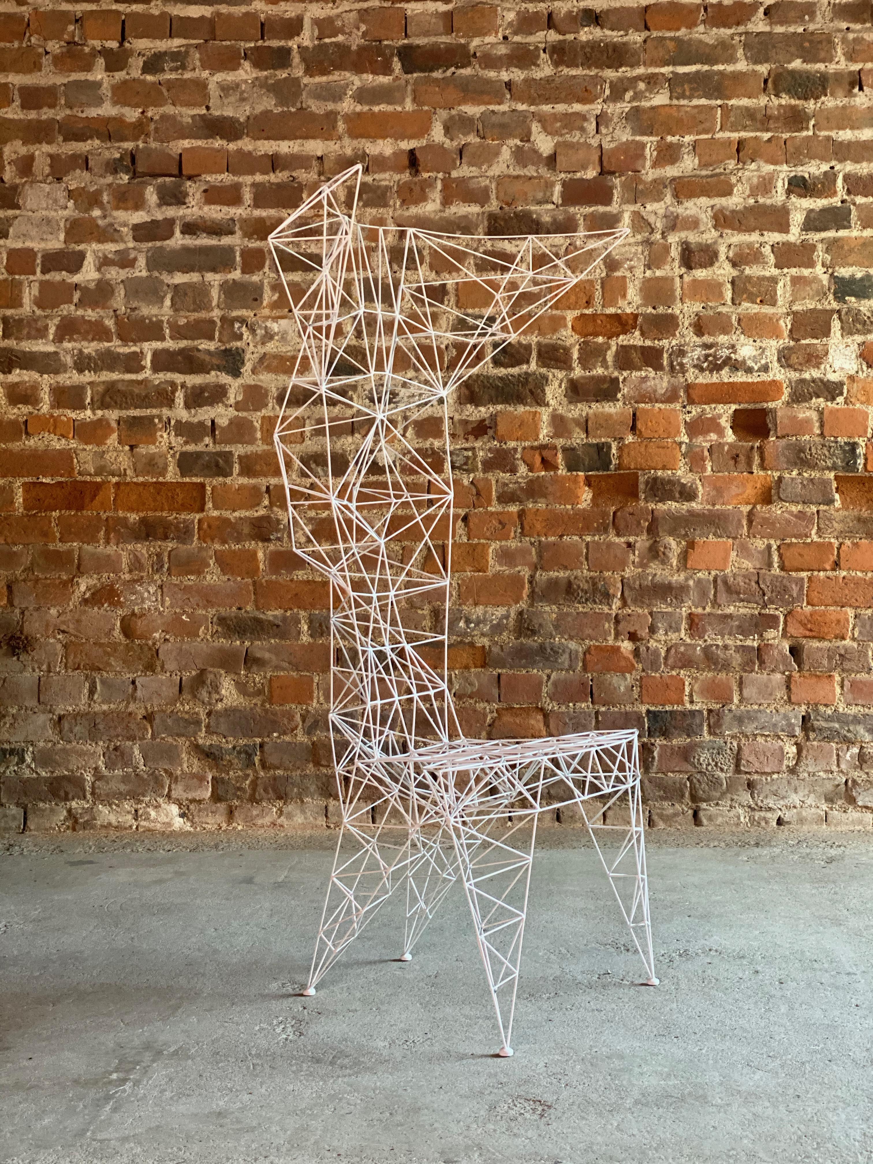 Tom Dixon Pylon chair Designed in 1991 British Design

Tom Dixon Pylon chair designed in 1991, triangulated steel rods with white powder-coated finish a modern day masterpiece. 

Originally created on a self-propelled mission to design the