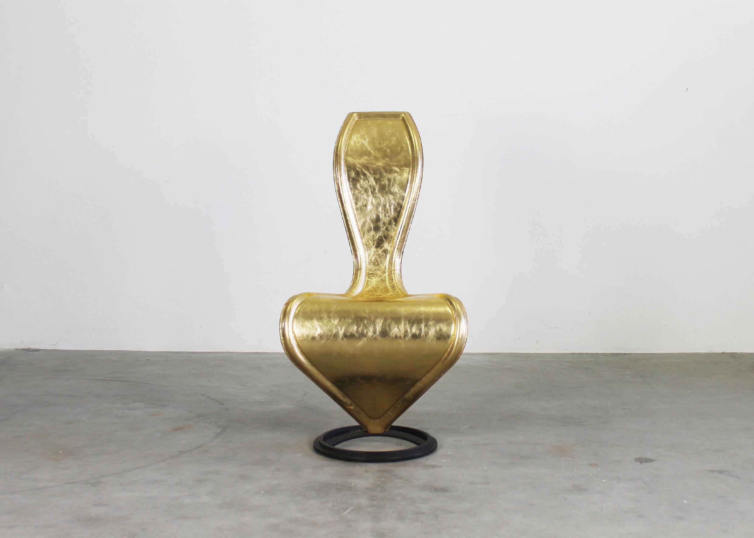 The S-chair has a metal structure and seat in gold leather, it was designed by Tom Dixon and produced by Cappellini in the 2000s.

Tom Dixon’s iconic S-Chair is an object with a handcrafted nature transformed into an authentic industrial success