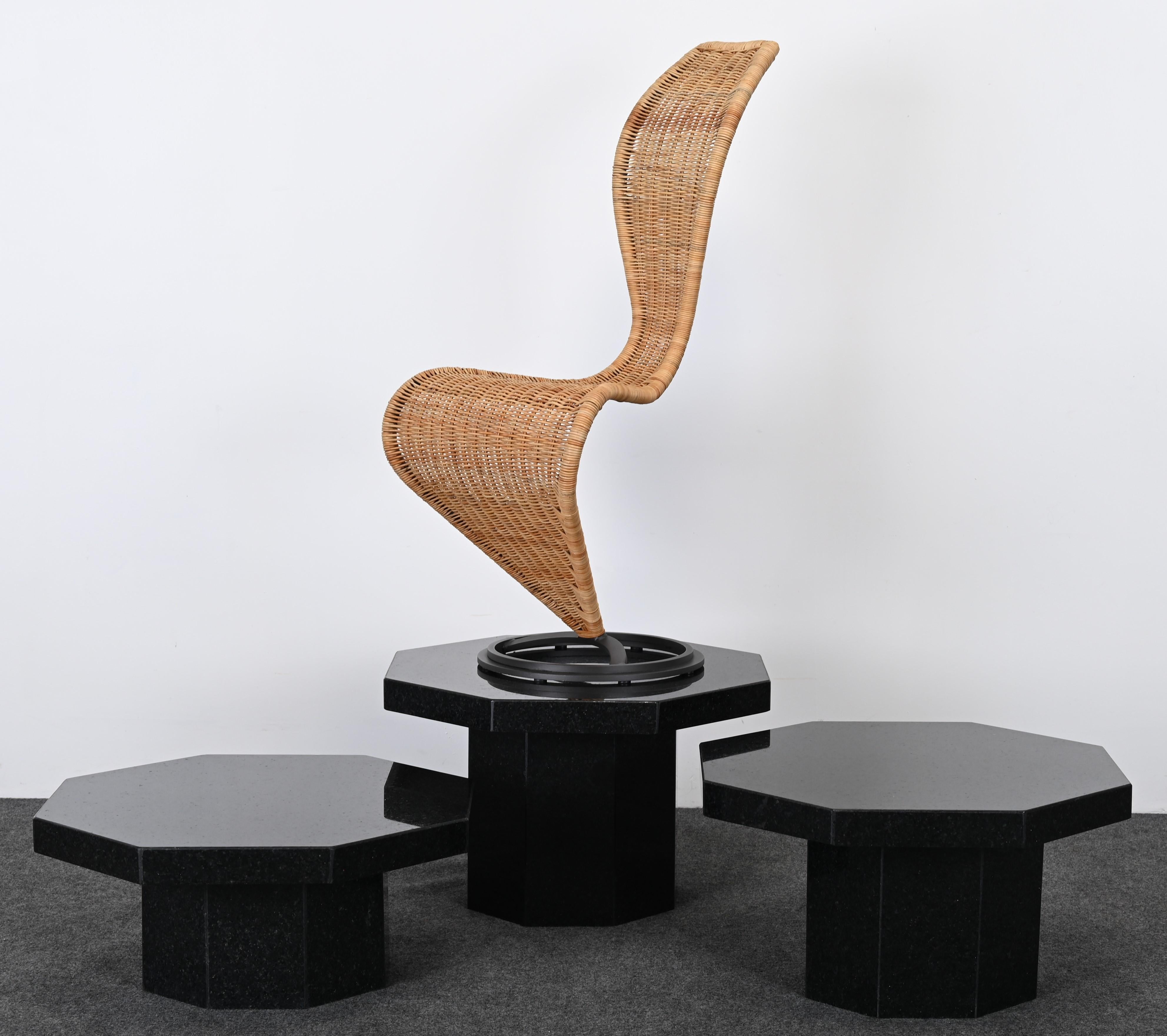 A wonderful Tom Dixon S-chair with Marsh Wicker for Cappellini. This iconic chair would look great in any Modern or Contemporary interior. Great accent piece. Available for purchase today. Octagonal pedestals shown in the images are available in