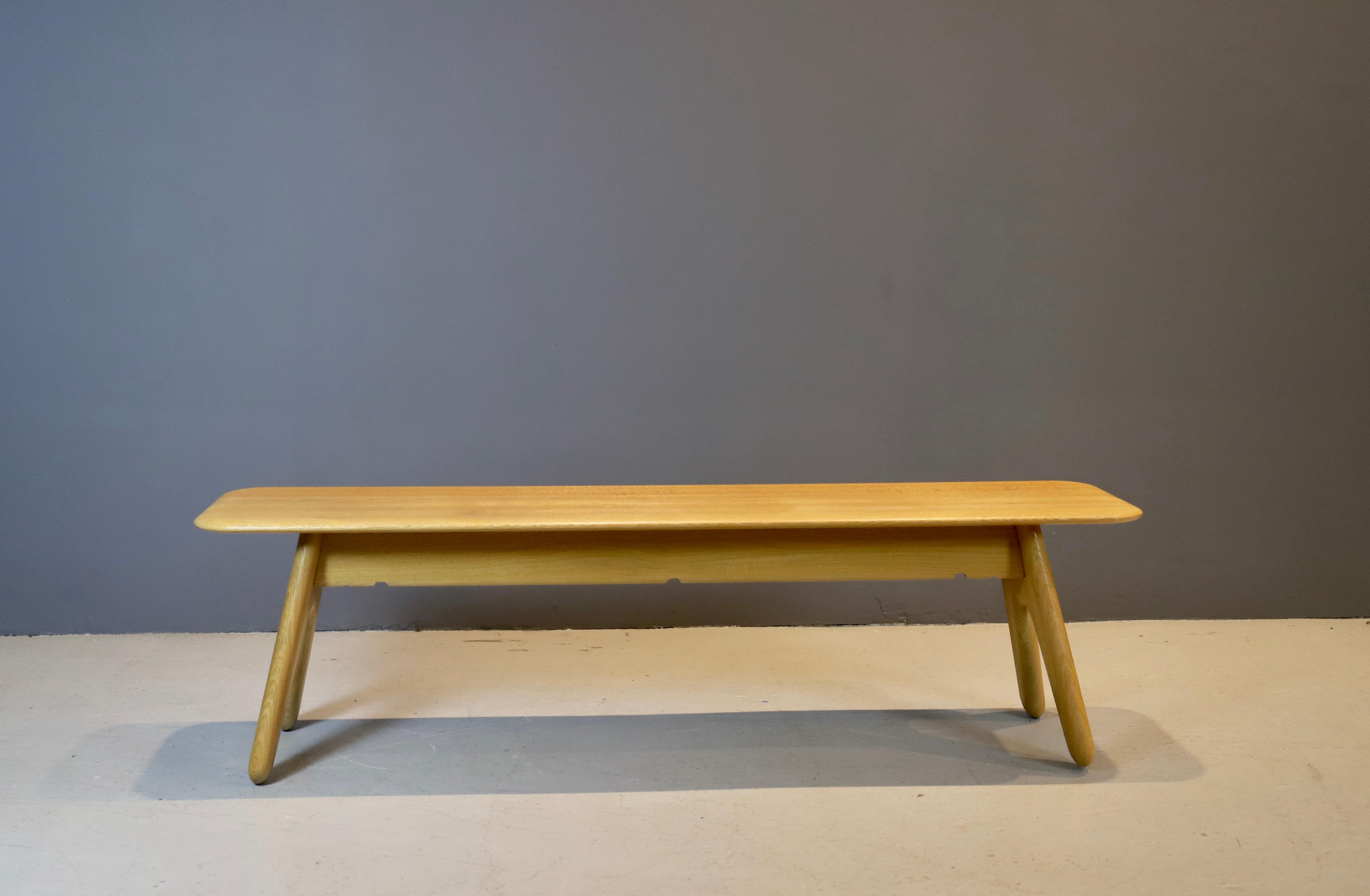 Organic form slab bench designed by Tom Dixon, circa 2000 and made of solid cerused oak.
Stamped underneath.
No longer in production.