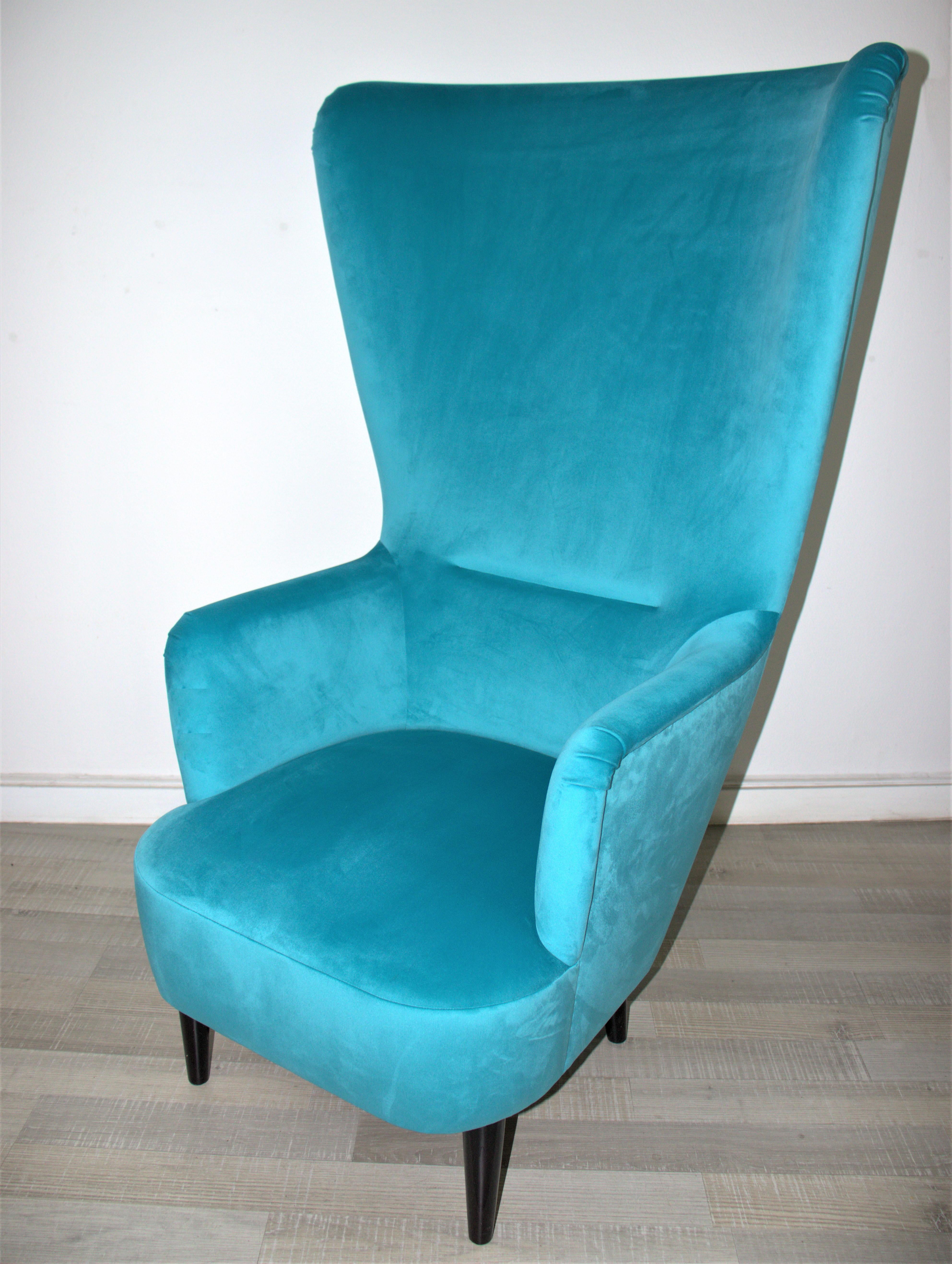 Velvet lounge chair in the style of Tom Dixon.