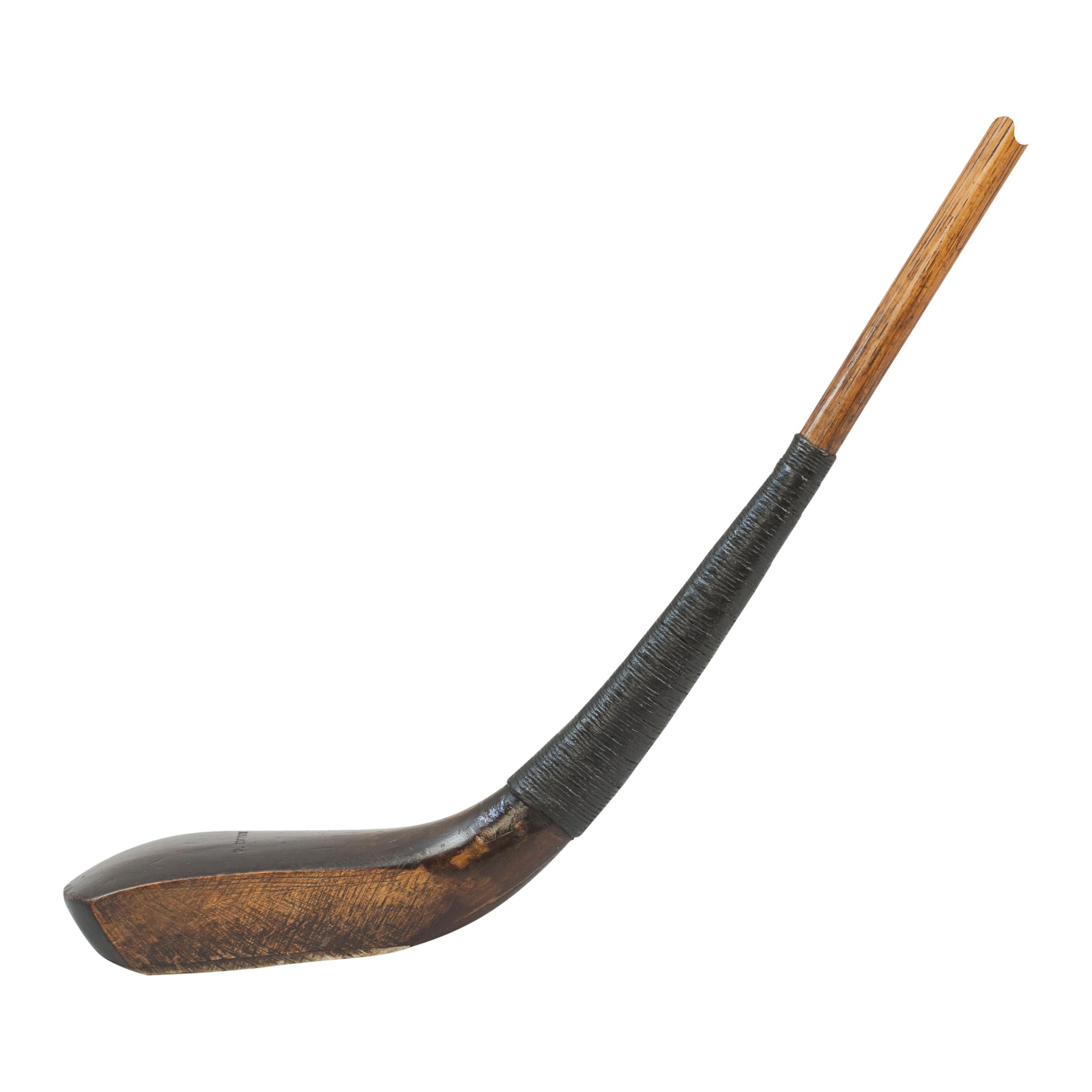 Scared Head Golf Club, Play Club, By Tom Dunn.
An elegant, prime example of a long nose golf club made by Tom Dunn of Wimbledon. The stained and polished beech-wood head in good original condition with historical repair (see images). There is a lead