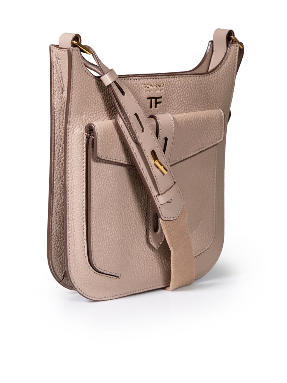 CONDITION is Very good. Minimal wear to bag is evident. Minimal indent and discolouration to the front of this used Tom Ford designer resale item.
 
 
 
 Details
 
 
 Beige
 
 Leather
 
 T-Twist mini crossbody bag
 
 1x Adjustable strap
 
 1x Main