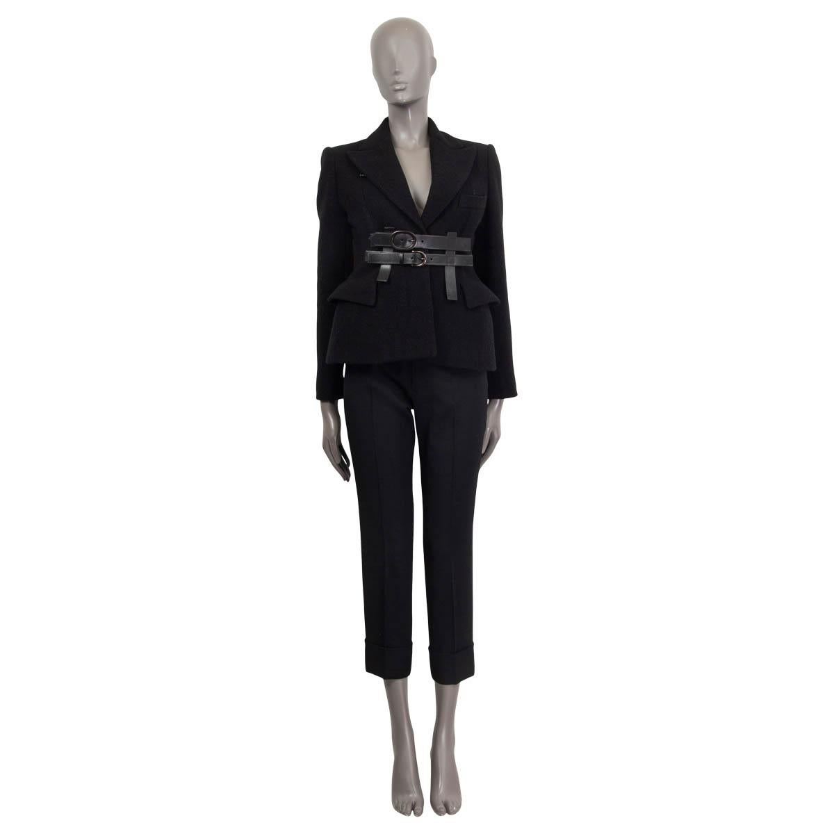100% authentic Tom Ford belted blazer jacket in black boiled fleece wool (100%). Fall/winter 2016 collection. Features buttoned cuffs, two sewn shut flap pockets and one sewn shut slit pocket. Has a detachable belt at the waist, padded shoulders and