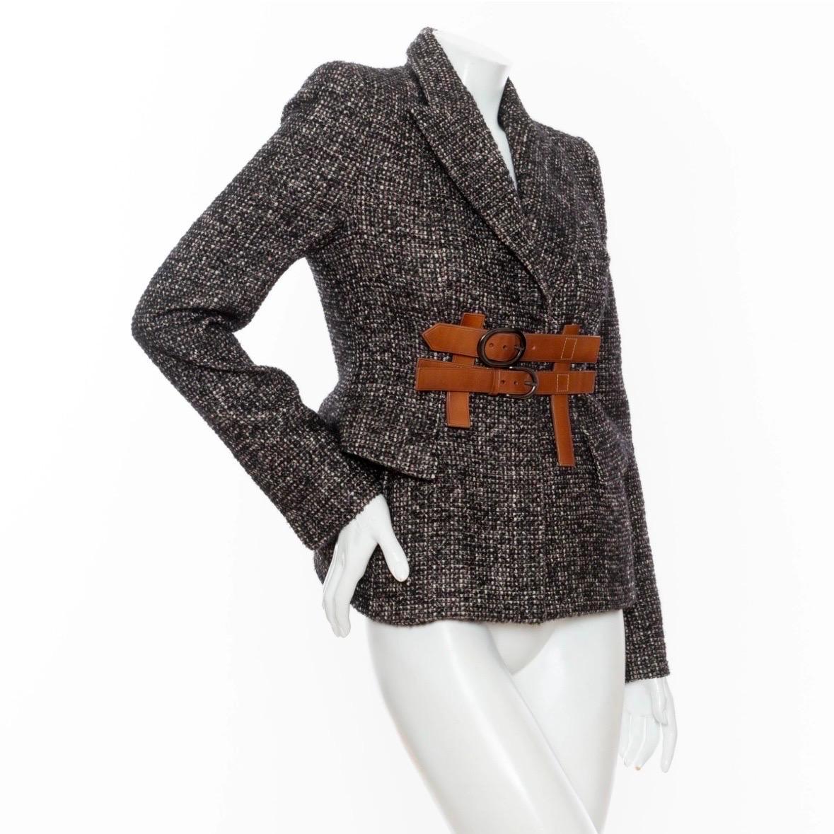 Tom Ford Black and Brown Tweed Belted Jacket

Black/Brown/White
Brown leather belted front
Antiqued silver-tone buckles
Pointed collar; optional high neck belted collar
Front flap pockets
Concealed buttons on cuffs
Inner pocket
Fitted silhouette