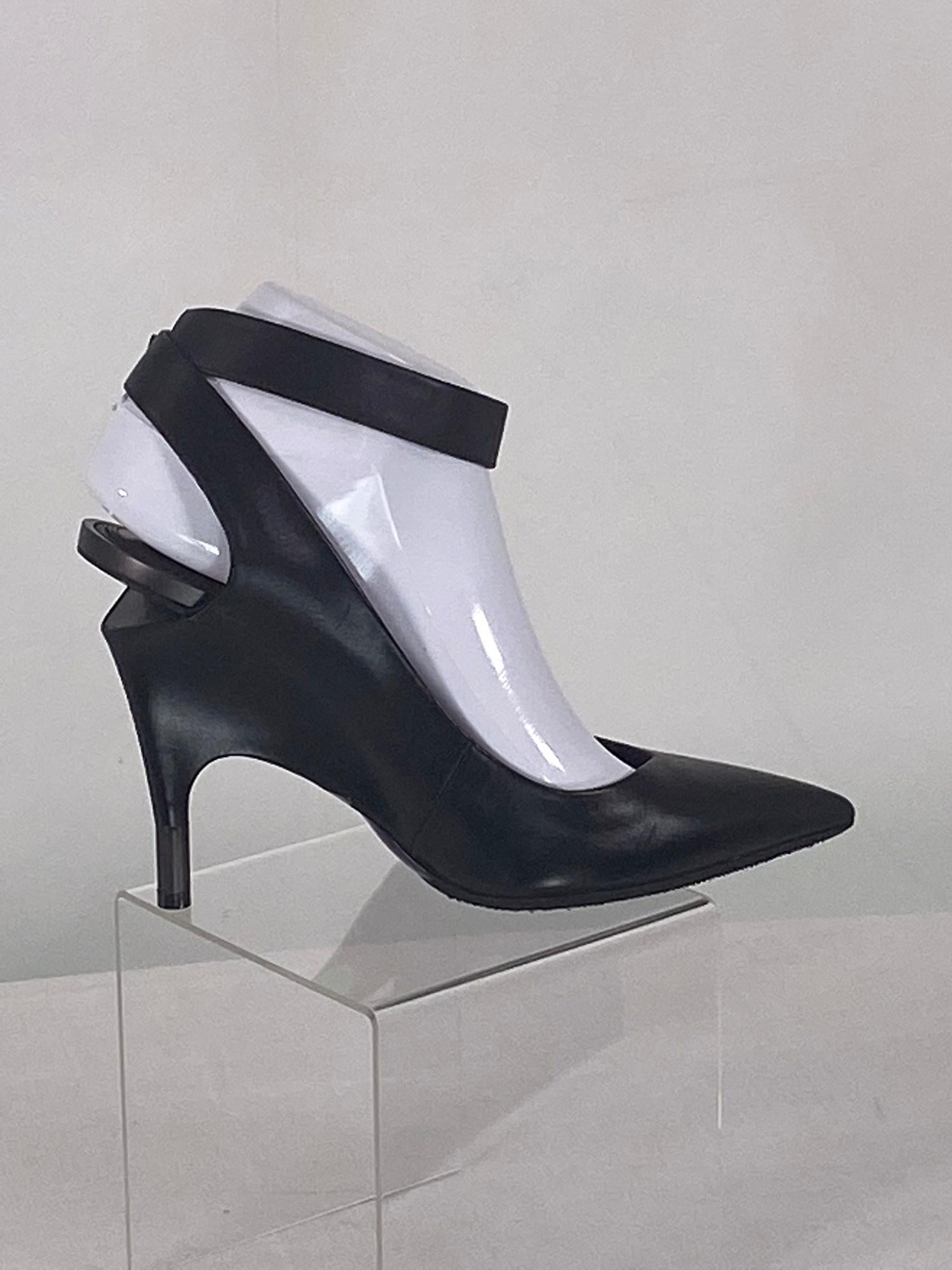 Tom Ford black calf, wedge heel, ankle strap, high heels 39. In excellent condition together with original box, protector bags & replacement caps. They look barely, if ever worn. 39/8 1/2. Non slip soles at the bottom front have been professionally