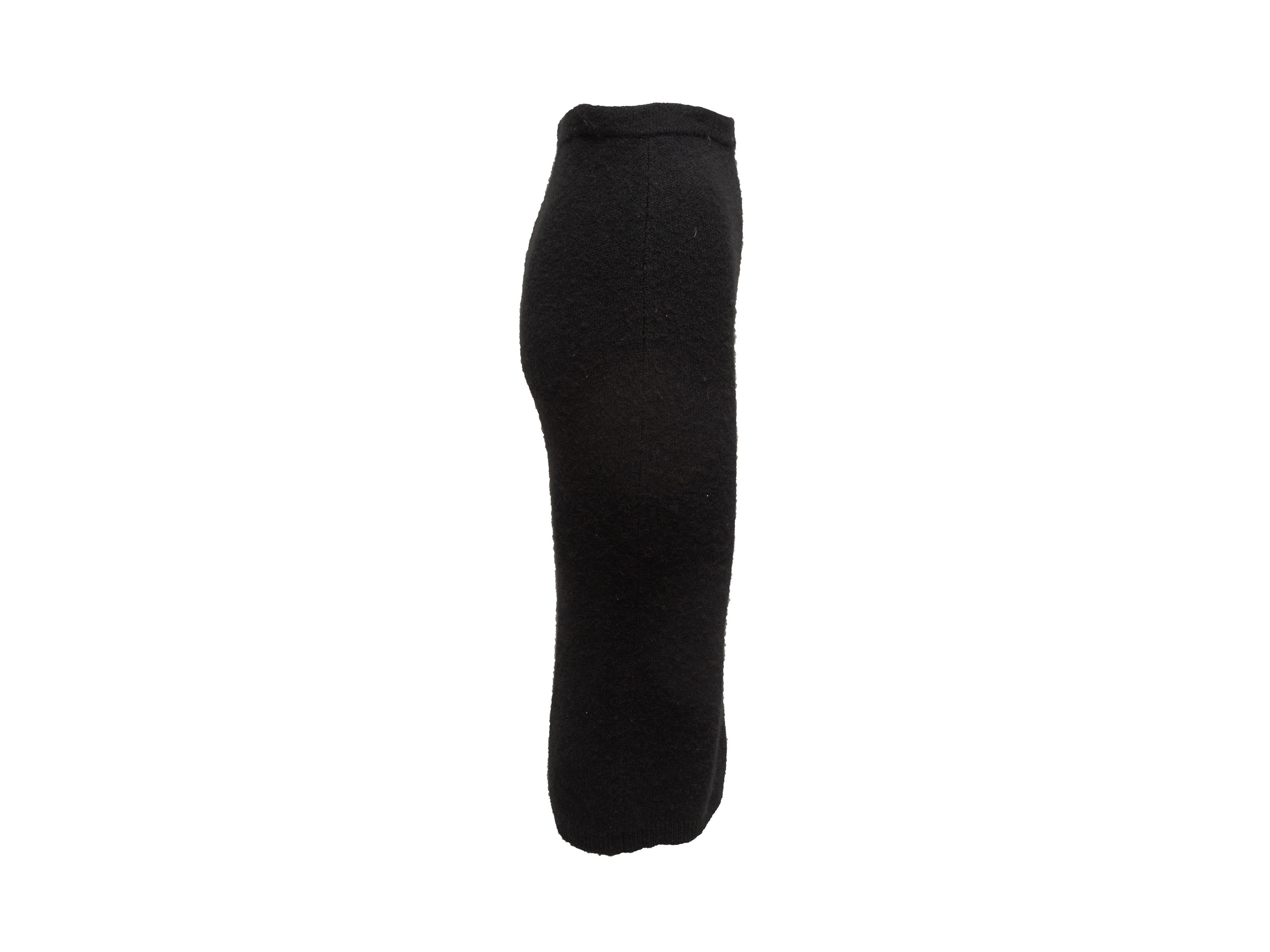 Product details: Black cashmere knit midi skirt by Tom Ford. 25