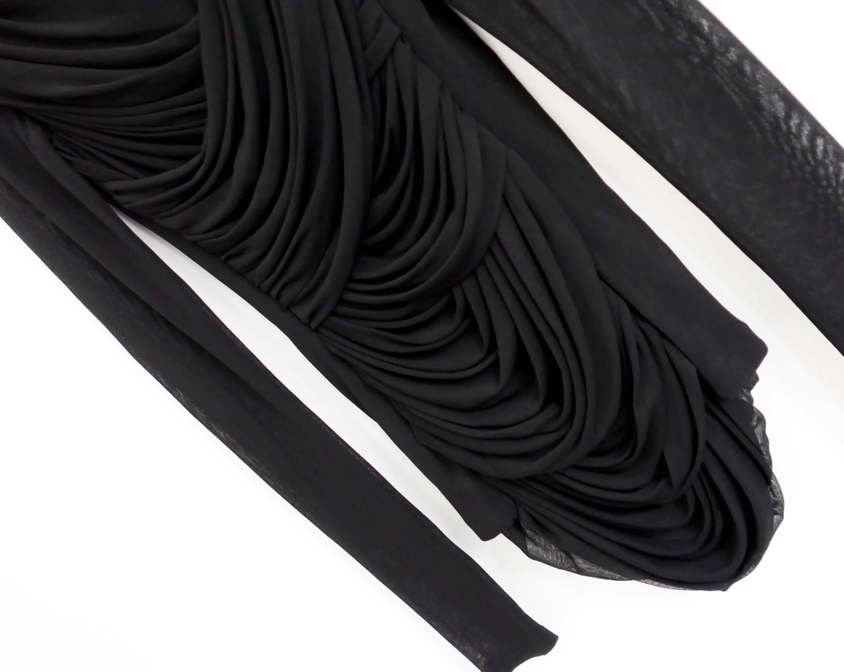 Ultra luxe, slinky chic Tom Ford draped top. Bought for €1290 and new with tags. Made from super stretchy black viscose tulle with delicate lamb leather trim to neck. It has a super sexy form fitting cut with draped front detailing, it is lined