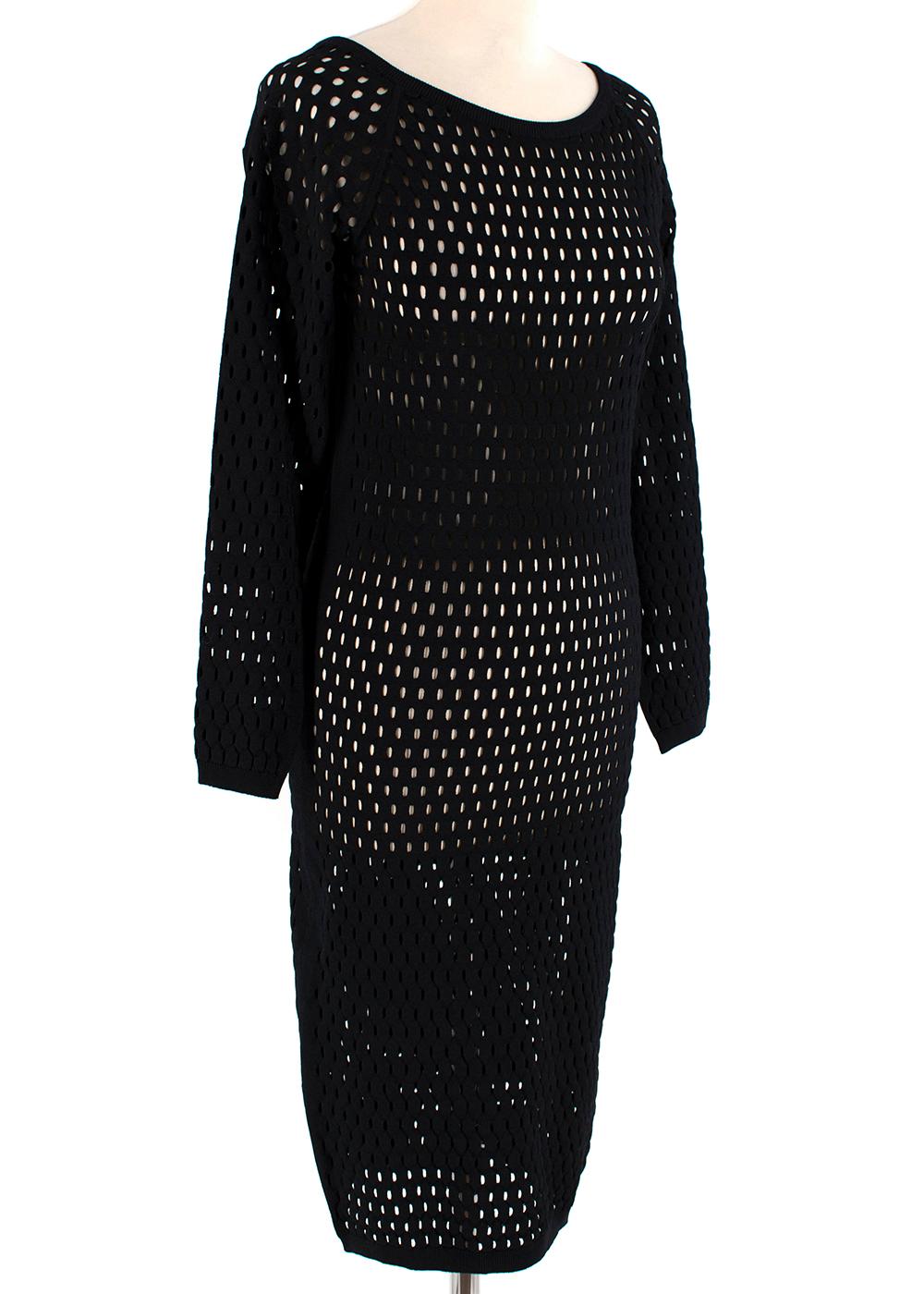 Tom Ford Black Fishnet Long Sleeve Dress

- Fish net mesh design
- Wide neckline
- Long sleeves
- Straight cut design
- Below the knee length
- This item may need a skin layer of clothing as it has a hole design
- Mid weight material

Fabric