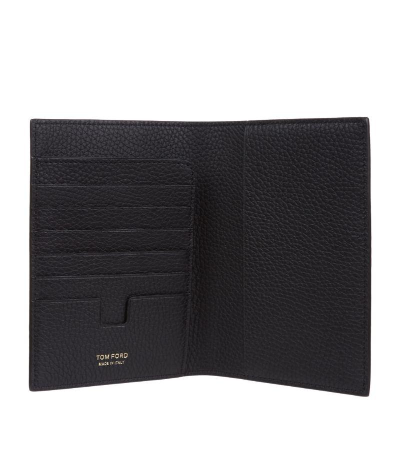 Tom Ford Black Grained Leather Passport Holder

Hosting six card slots and a larger pocket to hold your passport, the Italian-crafted accessory is punctuated with gold-tone logo detailing embossed to the front for a smart, signature finish.

Tom