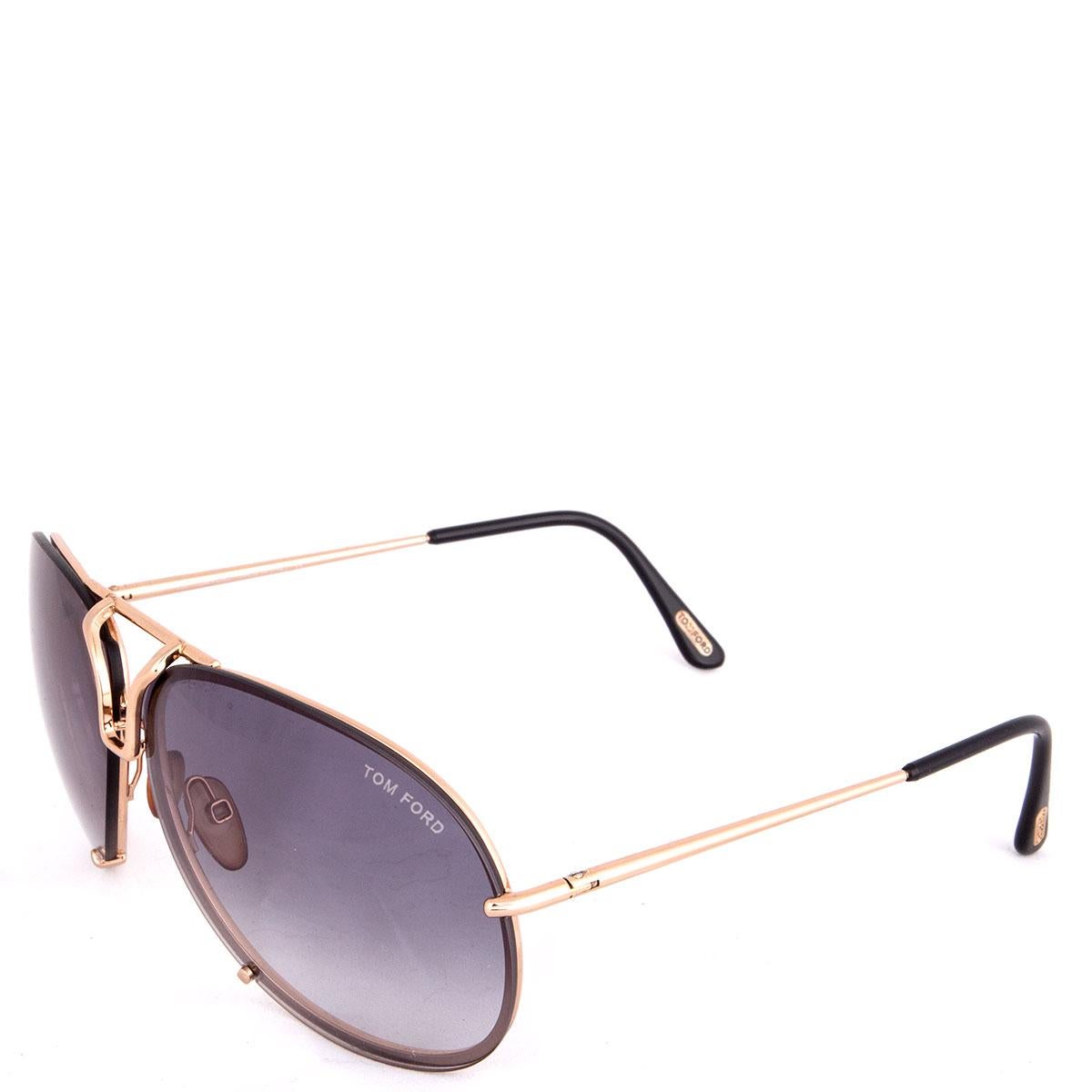 100% authentic Tom Ford Hawkings Aviator sunglasses in black acetate with grey gradient lenses featuring gold-tone metal frame. Have been worn and are in excellent condition. Come with case. 

Model	TF1 772 63-16 130
Width	15cm (5.9in)
Height	6cm