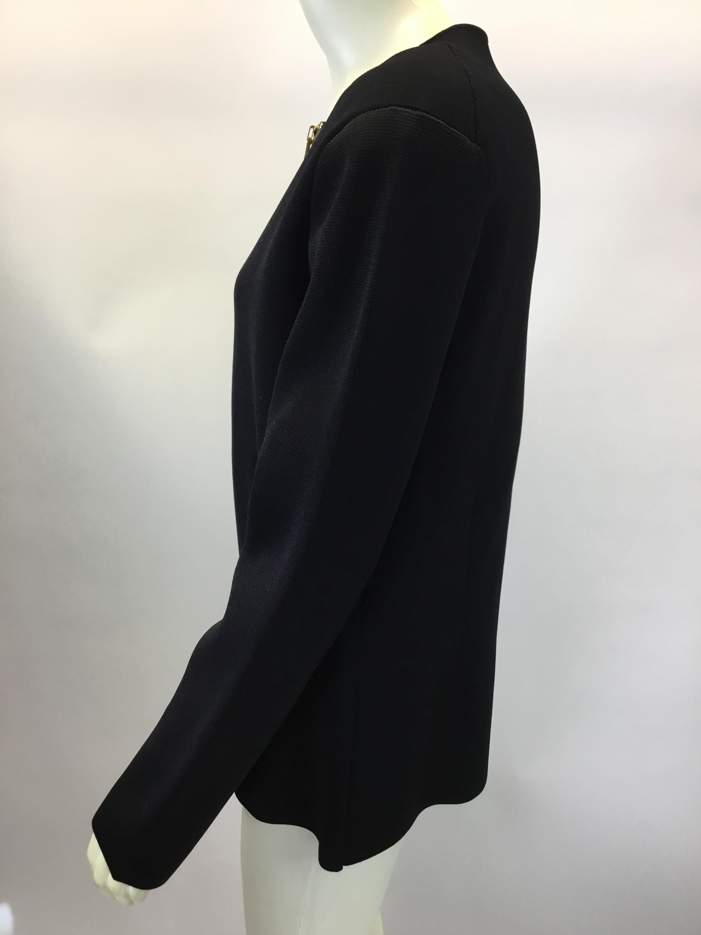 Tom Ford Black Knit Zippered Jacket 
$699
Made in Italy
94% Viscose, 6% Polyester
Leather Trim
Size 46
Length 24.5”
Bust 38”
Waist 33”