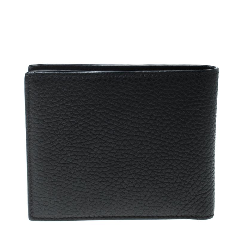 Leather wallets are a true sign of style and reliability, that's just why this Tom Ford wallet is an ideal buy. Made from leather, the wallet is sleek and sophisticated with a simple design and multiple slots to carry your cash and cards.

Includes: