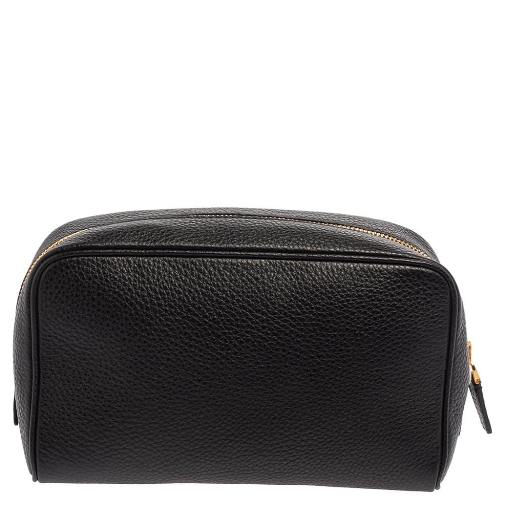 This Tom Ford cosmetic pouch is perfect for daily use or while traveling. It is crafted from leather in black and equipped with a zipper that reveals a spacious interior for your belongings. Grab it today!

Includes: Original Dustbag