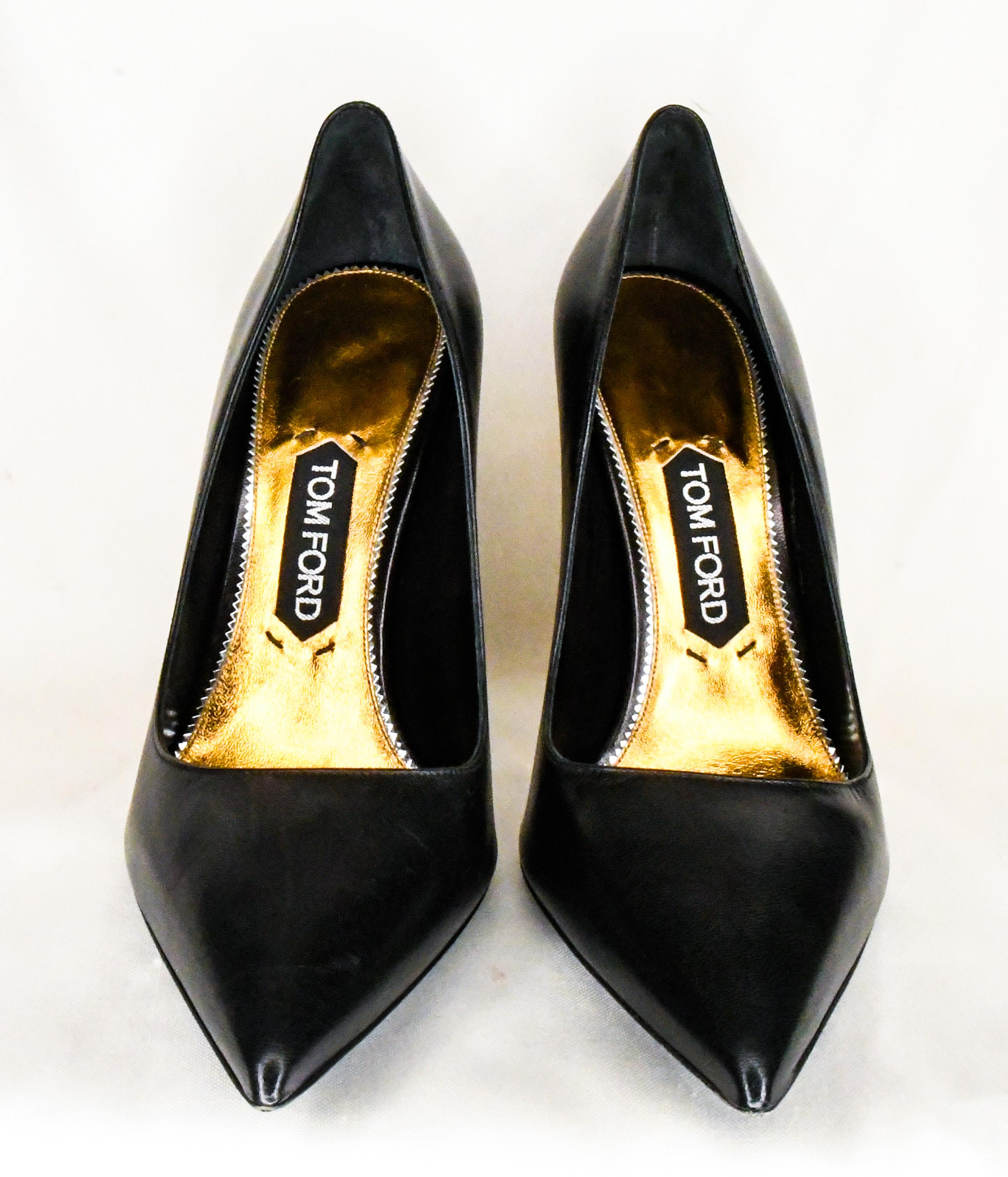 black pump with gold heel