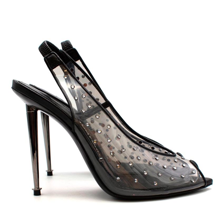 Tom Ford Black Leather & Vinyl Heeled Peep-toe Sling-backs with crystals 

-Gorgeous translucent vinyl surface with crystals 
-Iconic metal heels 
-Smooth black leather pipping 
-Luxurious soft leather lining 
-Pointy open toes 
-Fun, neutral and