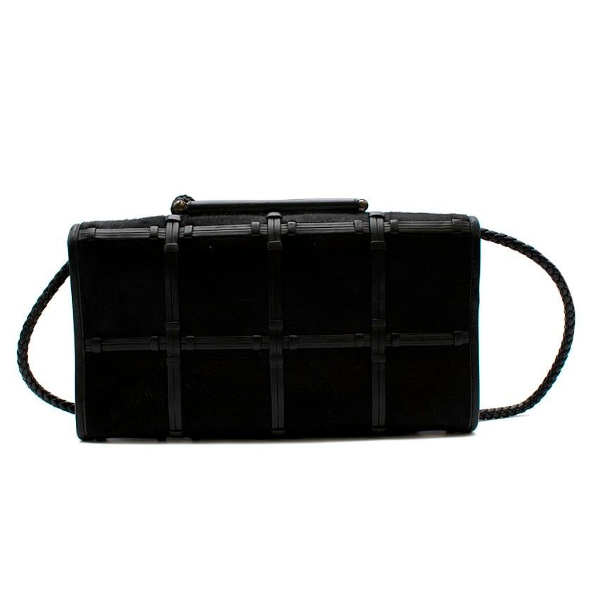 Tom Ford Black Pony Hair & Leather Caged Shoulder Bag With Tassels

- Two tassels on the handle 
- Leather check pattern detailing
- Metal twist fastening 
- Inside zip fastened pocket 

Materials:
- Pony Hair Leather
- Leather

Made in Italy