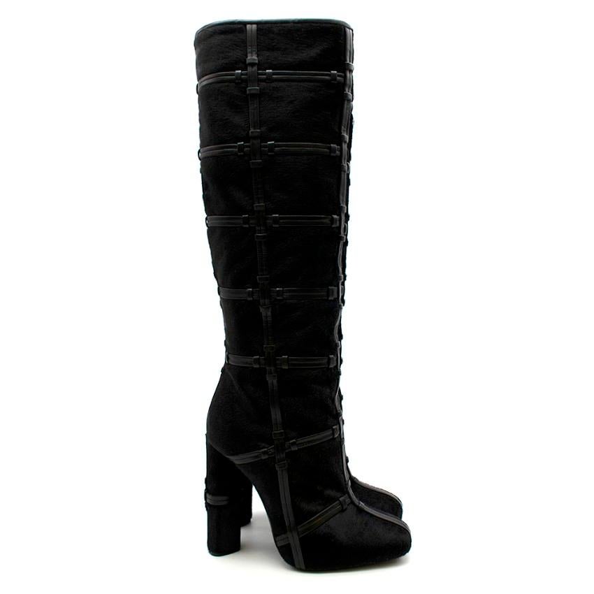 Tom Ford Black Pony Hair Leather Caged Tall Boots 

- Knee High 
- Zip fastening at the side 
- Leather check caged detailing 

Materials:
- Pony Hair
- Leather

Made in Italy

Heel height - 13cm
Insole - 22cm
Length - 51cm
