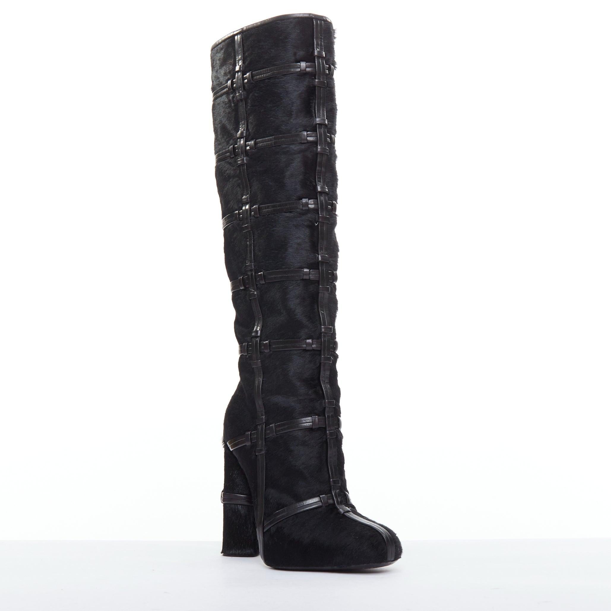 TOM FORD black ponyhair leather cage trim block heeled boots EU36
Reference: LAYU/A00059
Brand: Tom Ford
Material: Pony Hair, Leather
Color: Black
Pattern: Animal Print
Closure: Zip
Lining: Black Leather
Made in: Italy

CONDITION:
Condition: