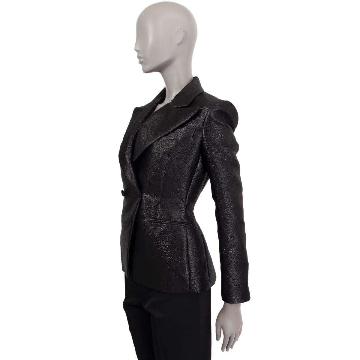 Tom Ford fitted blazer in black polyester (84%) and silk (16%) with silver lurex. Closes with one button at front and has one slit at the back. Brand new.  

Tag Size 36
Size XXS
Shoulder Width 38cm (14.8in)
Bust To 88cm (34.3in)
Waist To 67cm