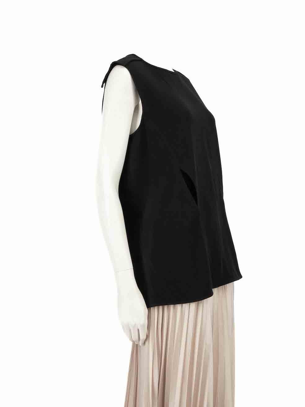 CONDITION is Very good. Hardly any visible wear to top is evident on this used Tom Ford designer resale item.
 
 
 
 Details
 
 
 Black
 
 Viscose
 
 Sleeveless top
 
 Round neckline
 
 Slash detail on waist
 
 Open back with snap button closure
 
