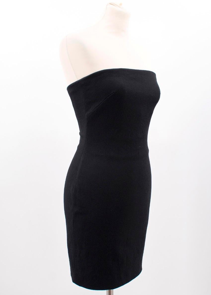 Tom Ford black strapless dress

- Stretch bodycon style
- Strapless
- Boned bodice
- concealed zipped back
- Mini fit

Made in Italy

Condition 9.5/10
Measurements are taken laying flat, seam to seam. 

Shoulders: 33cm
Length: 69cm