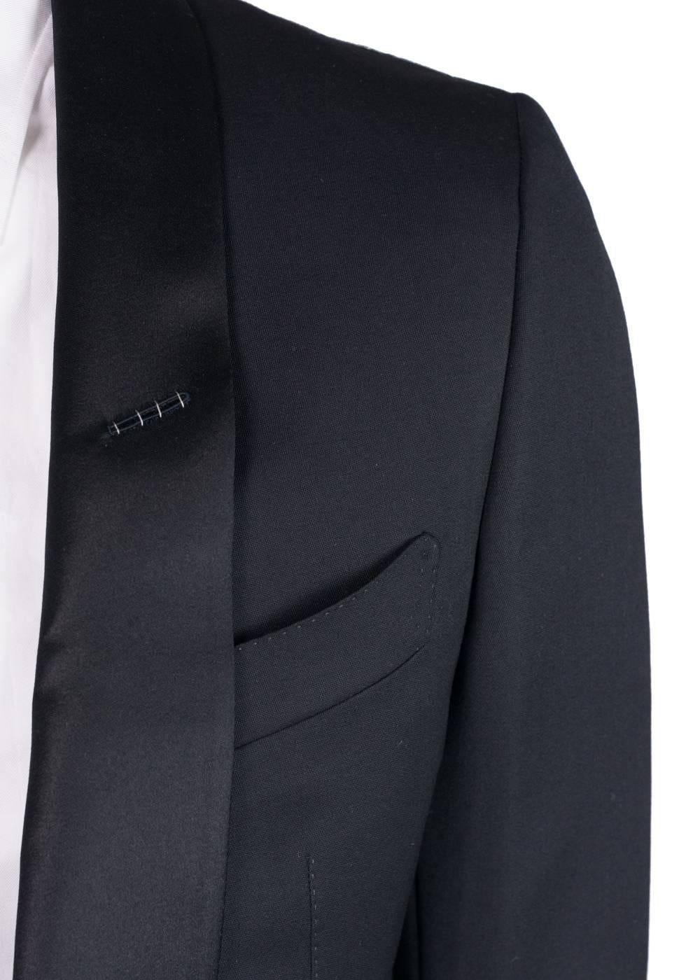 Brand New Tom Ford O'Connor Tuxedo
Original Tags & Hanger Included
Retails In-Stores & Online for $5470
IT 48R / US 38

A signature tuxedo, Tom Ford's Satin Shawl Lapel 'O'Connor' Base Tuxedo is crafted from a luxury twill fabric in rich black. This