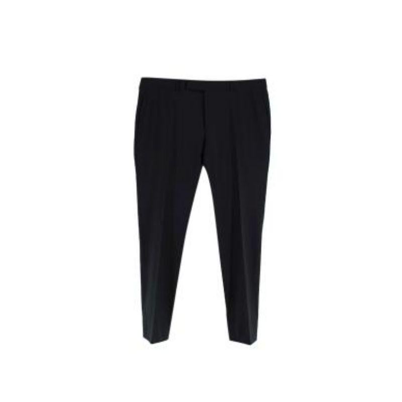 Tom Ford Black Wool Trousers

- Straight wool trousers
- Button and zipper clasp
- Belt loops
- Unlined

Condition: 9.5/10, excellent!

Material:
99% Wool
1% Cashmere 

Made in Switzerland.

Professional dry clean only. 

PLEASE NOTE, THESE ITEMS