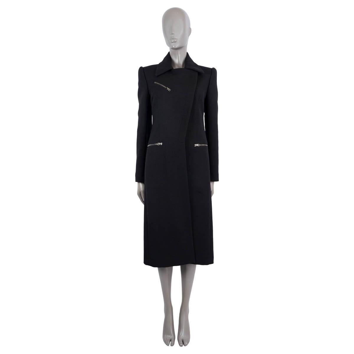100% authentic Tom Ford zip front coat in black wool (99%) and silk (1%). Features zipper pockets on the sides,  zipper cuffs and zipper chest. Slit on the back. Closes with half zipper on the front. Lined in black silk (90%) and elastane (10%). Has