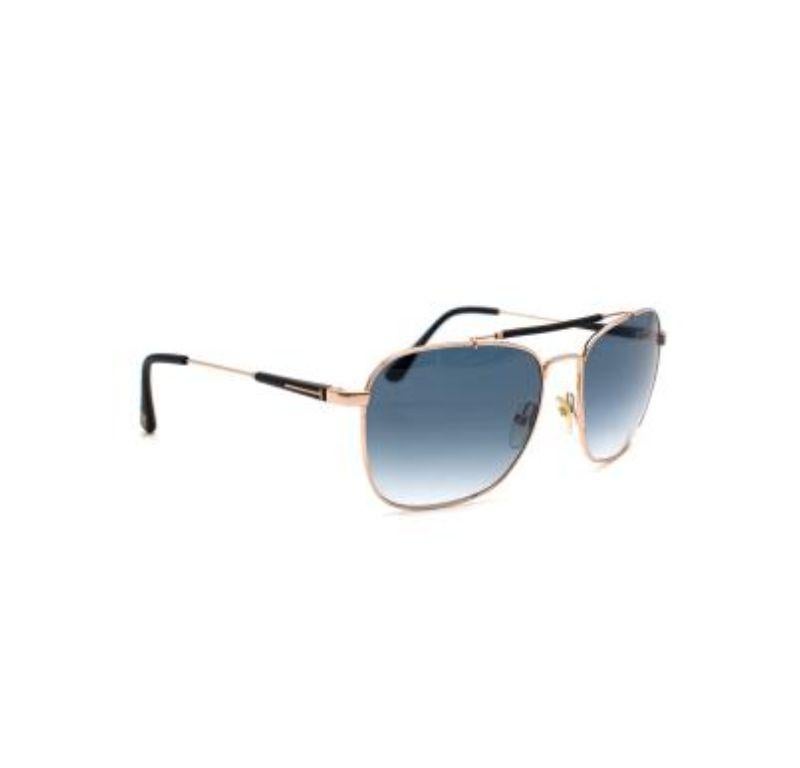 Tom Ford Blue Lens Edward Aviator Sunglasses

- Square shape
- Gold tone hardware
- Aviator style
- Blue gradient lenses

Material
Acetate

9.5/10 Excellent Condition

PLEASE NOTE, THESE ITEMS ARE PRE-OWNED AND MAY SHOW SIGNS OF BEING
STORED EVEN