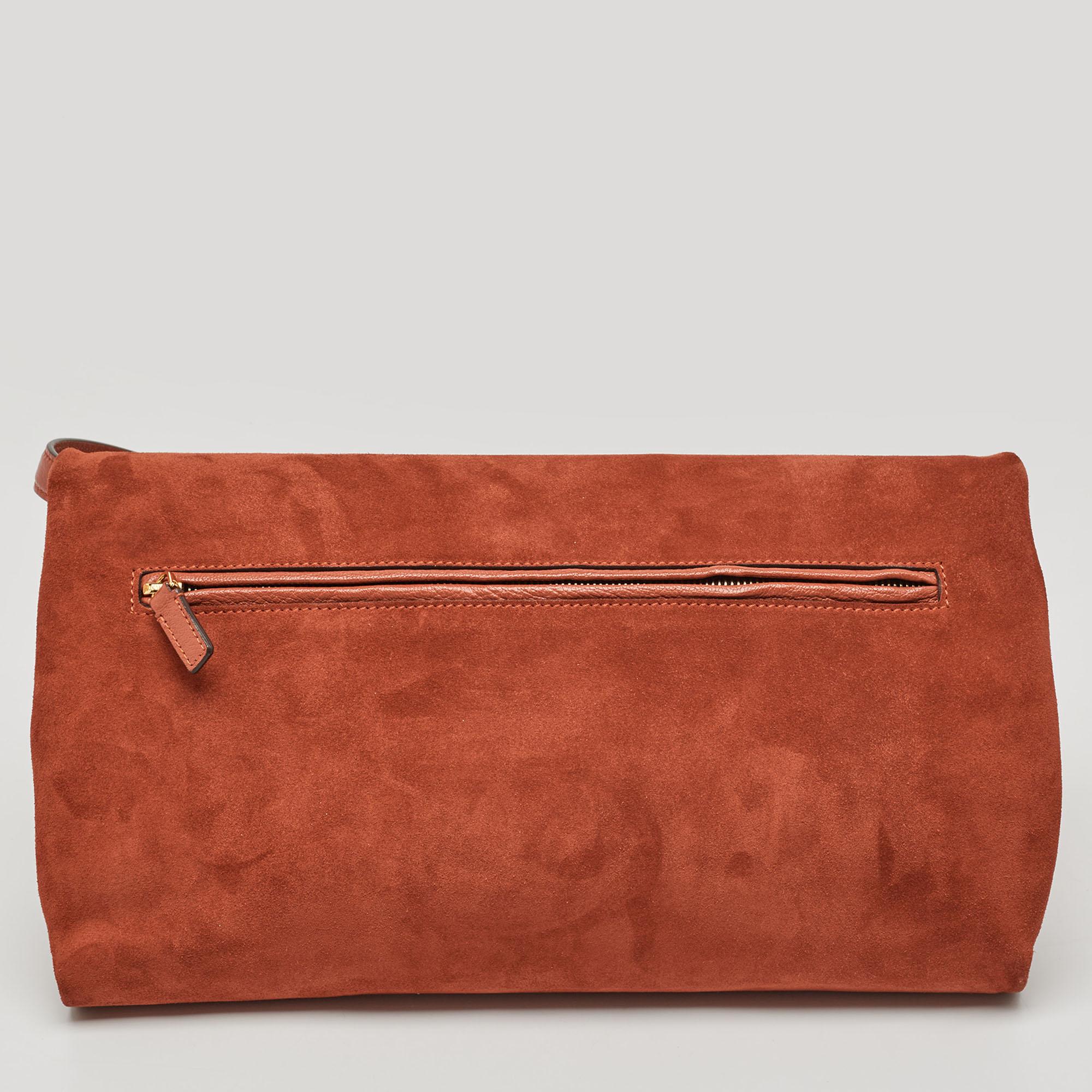 Functional and fashionable, this clutch is a classy styling choice. It is crafted from quality materials, and its lined interior will keep your evening essentials in a neat way.

Includes: Original Dustbag

