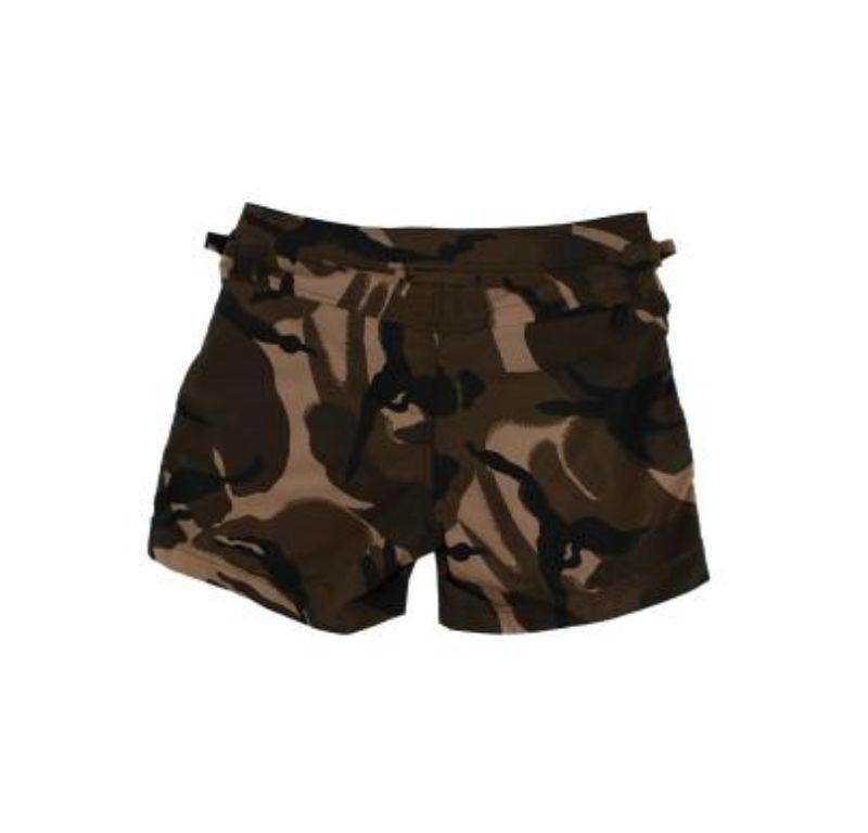 Tom Ford Camouflage Print Swim Shorts

- Tom Ford brown and black camouflage print swim shorts with gold-coloured metal hardware
- Mesh pockets on either side front, as well as one zip-shut pocket on back left-side
- Small adjustable waist belts on