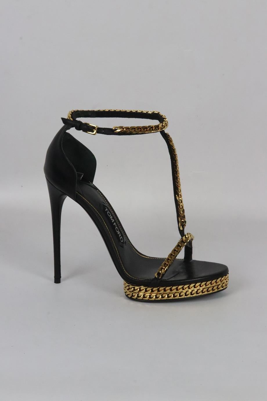 Tom Ford chain detailed leather platform sandals. Black and gold. Buckle fastening at side. Does not come with dustbag or box. Size: EU 38.5 (UK 5.5, US 8.5). Insole: 9.6 in. Heel Height: 4 in. Platform: 0.9 in. New without box